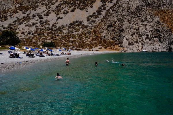 Gente Disfruta Del Sol Mar Playa Symi Dodecanese Grecia Agosto —  Fotos de Stock