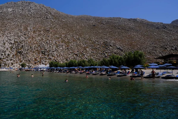 Gente Disfruta Del Sol Mar Playa Isla Symi Grecia Agosto —  Fotos de Stock