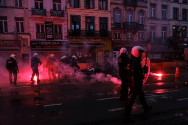 Belçika 'nın Brüksel kentinde 27 Kasım 2022 tarihinde oynanan Katar 2022 Dünya Kupası futbol karşılaşması sonrasında, protestocular toplum polisiyle çatışmaya girdi.. 