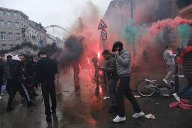 Fas taraftarları, Belçika 'nın Brüksel kentinde 27 Kasım 2022 tarihinde oynanan Katar 2022 Dünya Kupası futbol karşılaşması sonrasında çevik kuvvet ekibiyle çatıştı..