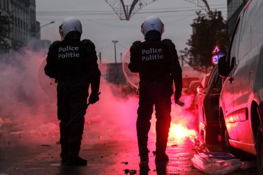 Fas taraftarları, Belçika 'nın Brüksel kentinde 27 Kasım 2022 tarihinde oynanan Katar 2022 Dünya Kupası futbol karşılaşması sonrasında çevik kuvvet ekibiyle çatıştı..