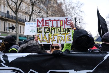 Protesters take part in a demonstration against the pension overhauls in Paris, France on January 19, 2023. 