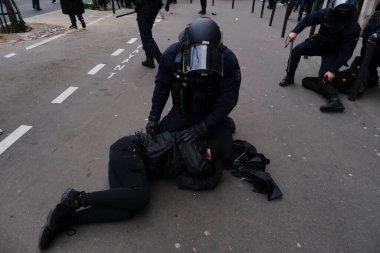 Protesters take part in a demonstration against the pension overhauls in Paris, France on January 19, 2023. 