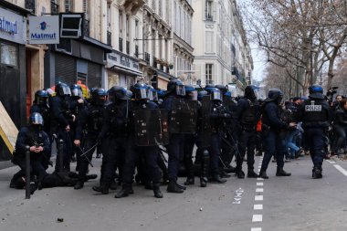 Protesters take part in a demonstration against the pension overhauls in Paris, France on January 19, 2023. 