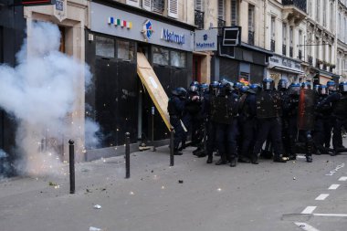 Protesters take part in a demonstration against the pension overhauls in Paris, France on January 19, 2023. 