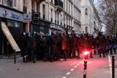 Protesters take part in a demonstration against the pension overhauls in Paris, France on January 19, 2023. 
