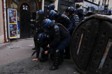Protesters take part in a demonstration against the pension overhauls in Paris, France on January 19, 2023. 