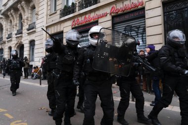 Protesters take part in a demonstration against the pension overhauls in Paris, France on January 19, 2023. 