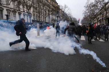 Protesters take part in a demonstration against the pension overhauls in Paris, France on January 19, 2023. 
