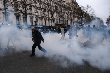 Protesters take part in a demonstration against the pension overhauls in Paris, France on January 19, 2023. 