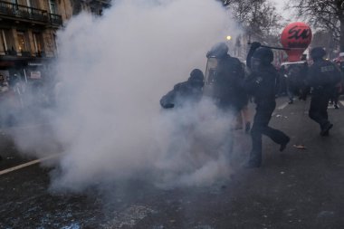 Protesters take part in a demonstration against the pension overhauls in Paris, France on January 19, 2023. 