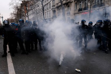 Protesters take part in a demonstration against the pension overhauls in Paris, France on January 19, 2023. 