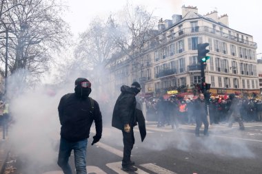 Protesters take part in a demonstration against the pension overhauls in Paris, France on January 19, 2023. 