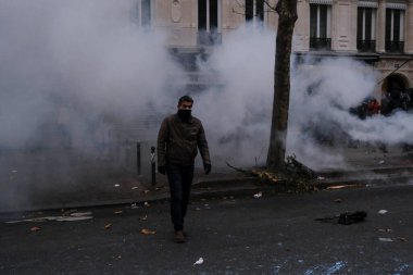 Protesters take part in a demonstration against the pension overhauls in Paris, France on January 19, 2023. 