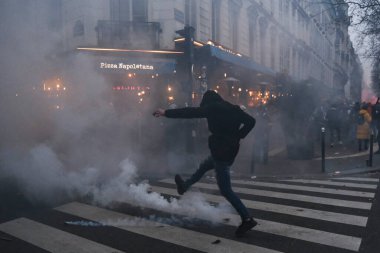 Protesters take part in a demonstration against the pension overhauls in Paris, France on January 19, 2023. 