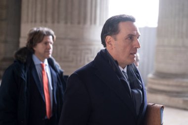 Lawyers of former EU Parliament Vice-President Eva Kaili, Michalis Dimitrakopoulos and Andre Risopoulos speak with the media at the courthouse in Brussels, Belgium on  January 19, 2023
