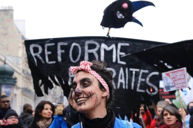 People gather in central streets to take part in a national strike against government plans to revamp the pension system in central Paris, France on January 19, 2023.