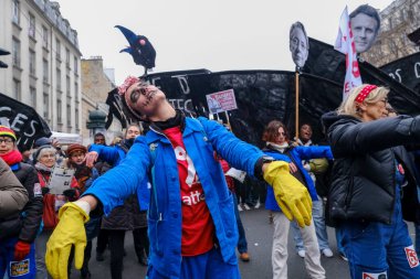 People gather in central streets to take part in a national strike against government plans to revamp the pension system in central Paris, France on January 19, 2023.