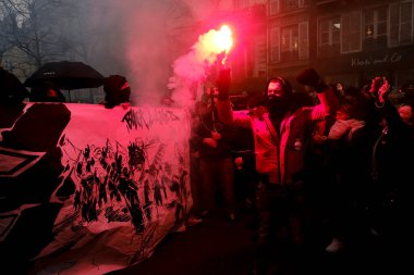 People gather in central streets to take part in a national strike against government plans to revamp the pension system in central Paris, France on January 19, 2023.