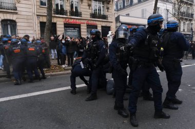 Riot police clashed with protestors during a demonstration in a national strike against government plans to revamp the pension system in central Paris, France on January 19, 2023.