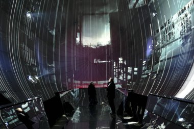 Visitors take a tour in Light Art Museum in Budapest, Hungary on Dec.21, 2022.