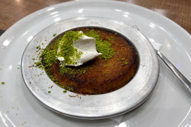 Turkish dessert kunefe served in restaurant in Brussels, Belgium on Jan. 20, 2023.