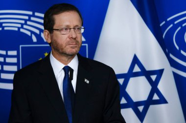 Israeli President Isaac Herzog and President of the European Parliament Roberta Metsola give a presser at the European Parliament in Brussels, Belgium January 26, 2023. clipart