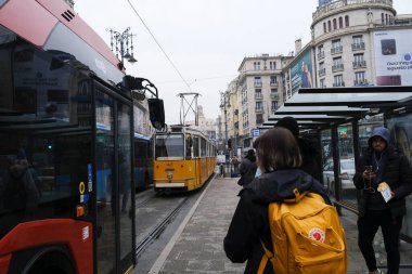 Typical yellow old tram in street of Budapest, Hungary on December 22, 2022.
