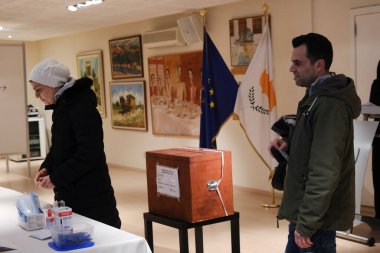 Cypriots who live abroad arrive to cast their ballots for the Cypriot presidential elections at a polling station in Brussels, Belgium on February 5, 2023.