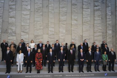 NATO Secretary General Jens Stoltenberg poses with NATO Defence ministers for a family picture on the second day of a meeting at the NATO headquarter in Brussels, Belgium 15, 2023.