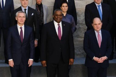NATO Secretary General Jens Stoltenberg poses with NATO Defence ministers for a family picture on the second day of a meeting at the NATO headquarter in Brussels, Belgium 15, 2023.