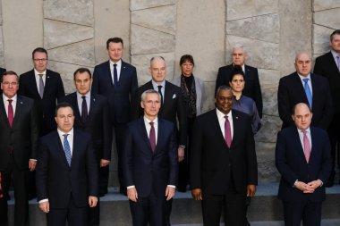 NATO Secretary General Jens Stoltenberg poses with NATO Defence ministers for a family picture on the second day of a meeting at the NATO headquarter in Brussels, Belgium 15, 2023.