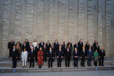 NATO Secretary General Jens Stoltenberg poses with NATO Defence ministers for a family picture on the second day of a meeting at the NATO headquarter in Brussels, Belgium 15, 2023.