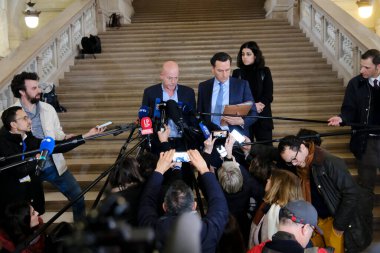 Lawyers Sven Mary and Michalis Dimitrakopoulos speak to media at the end of a hearing at the Court of Justice on February 16, 2023 in Brussels, Belgium.