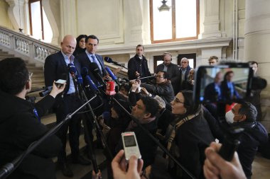 Lawyers Sven Mary and Michalis Dimitrakopoulos speak to media at the end of a hearing at the Court of Justice on February 16, 2023 in Brussels, Belgium.