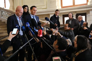 Lawyers Sven Mary and Michalis Dimitrakopoulos speak to media at the end of a hearing at the Court of Justice on February 16, 2023 in Brussels, Belgium.