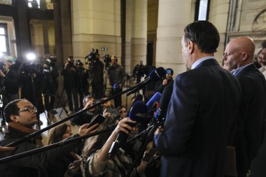 Lawyers Sven Mary and Michalis Dimitrakopoulos speak to media at the end of a hearing at the Court of Justice on February 16, 2023 in Brussels, Belgium.