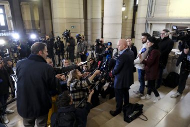 Lawyers Sven Mary and Michalis Dimitrakopoulos speak to media at the end of a hearing at the Court of Justice on February 16, 2023 in Brussels, Belgium.