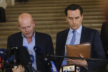 Lawyers Sven Mary and Michalis Dimitrakopoulos speak to media at the end of a hearing at the Court of Justice on February 16, 2023 in Brussels, Belgium.