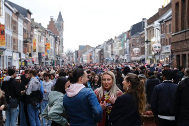 Crowd of people during the carnival festivities  in streets of Binche in Belgium on 19th Feb. 2023, 