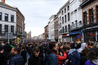 Crowd of people during the carnival festivities  in streets of Binche in Belgium on 19th Feb. 2023, 