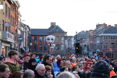 Crowd of people during the carnival festivities  in streets of Binche in Belgium on 19th Feb. 2023, 