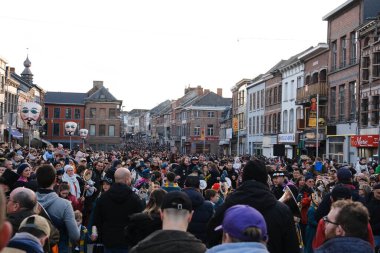 Crowd of people during the carnival festivities  in streets of Binche in Belgium on 19th Feb. 2023, 