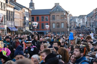 Crowd of people during the carnival festivities  in streets of Binche in Belgium on 19th Feb. 2023, 