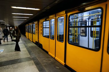Passengers wait in platform in metro station in Budapest, Hungary on December 21 ,2022.