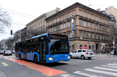A public transport bus on the road in Budapest , Hungary on December 21, 2022.