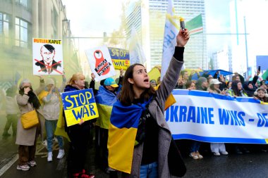 Several thousand people take part in a demonstration for the first anniversary of the Russian invasion in Brussels, Belgium on Feb. 25, 2023.