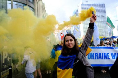 Several thousand people take part in a demonstration for the first anniversary of the Russian invasion in Brussels, Belgium on Feb. 25, 2023.