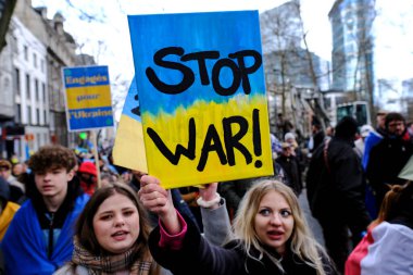 Several thousand people take part in a demonstration for the first anniversary of the Russian invasion in Brussels, Belgium on Feb. 25, 2023.