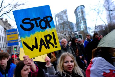 Several thousand people take part in a demonstration for the first anniversary of the Russian invasion in Brussels, Belgium on Feb. 25, 2023.